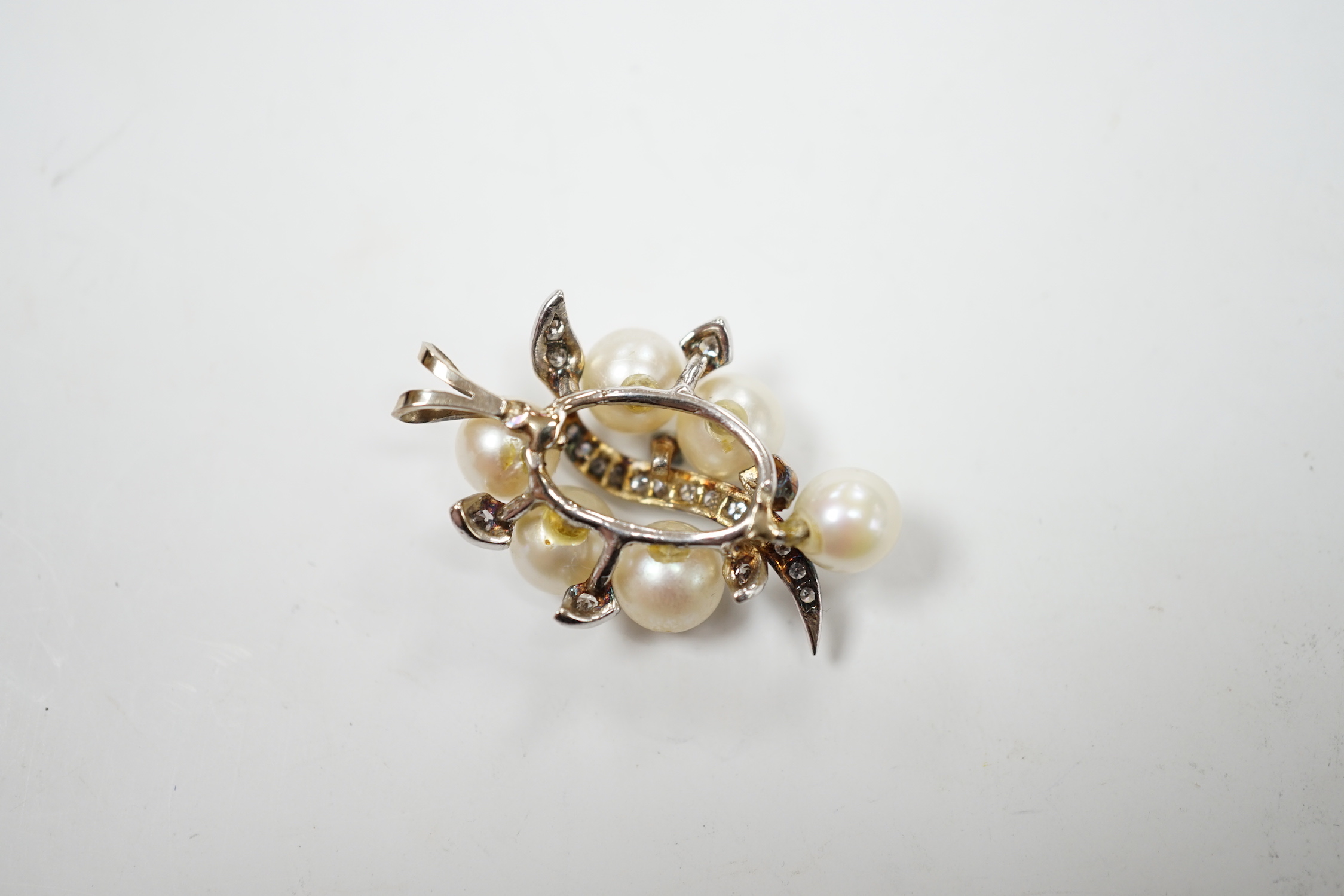 A yellow and white metal, cultured pearl and diamond cluster set spray pendant, 33mm, gross weight 6.1 grams.